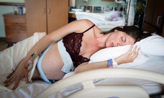 Woman laying on side during labor